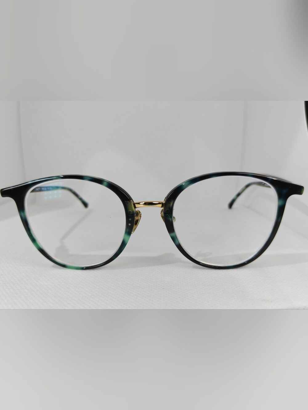 Aloft. Classic Round Women's Eyeglasses in Green Marble Tortoise Gold.